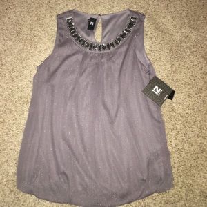Women’s blouse with subtle sparkles and jewels