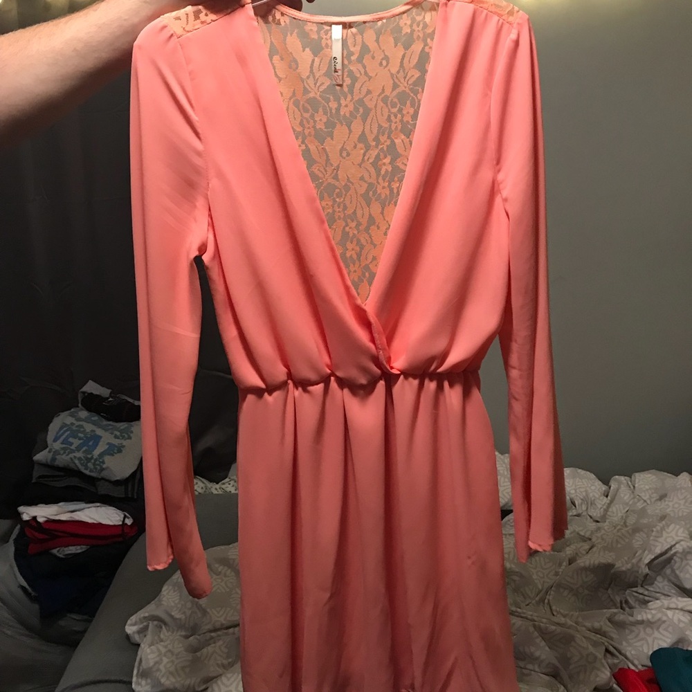 Long sleeve, low cut dress