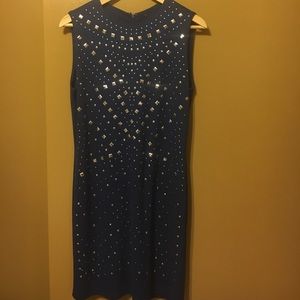 Short Blue Dress With Metal Embellishments.