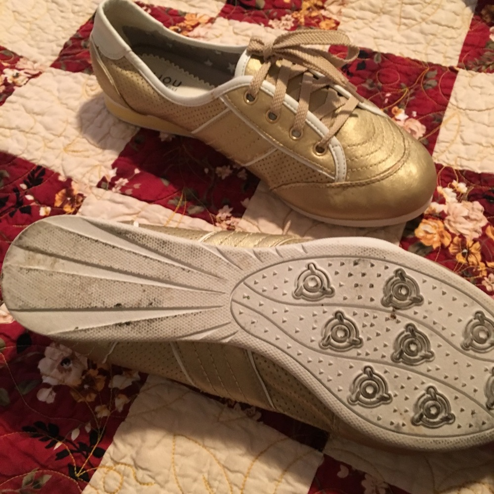 Gold tennis shoes