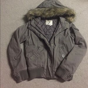 Gray hooded jacket with fur trim