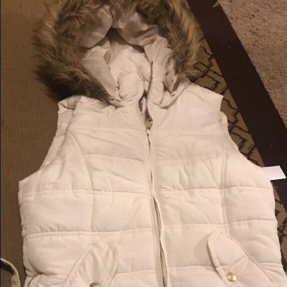 White vest with faux fur lined hood