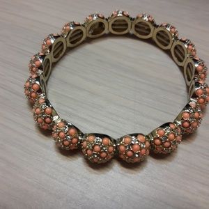Peach /gold metal bracelet