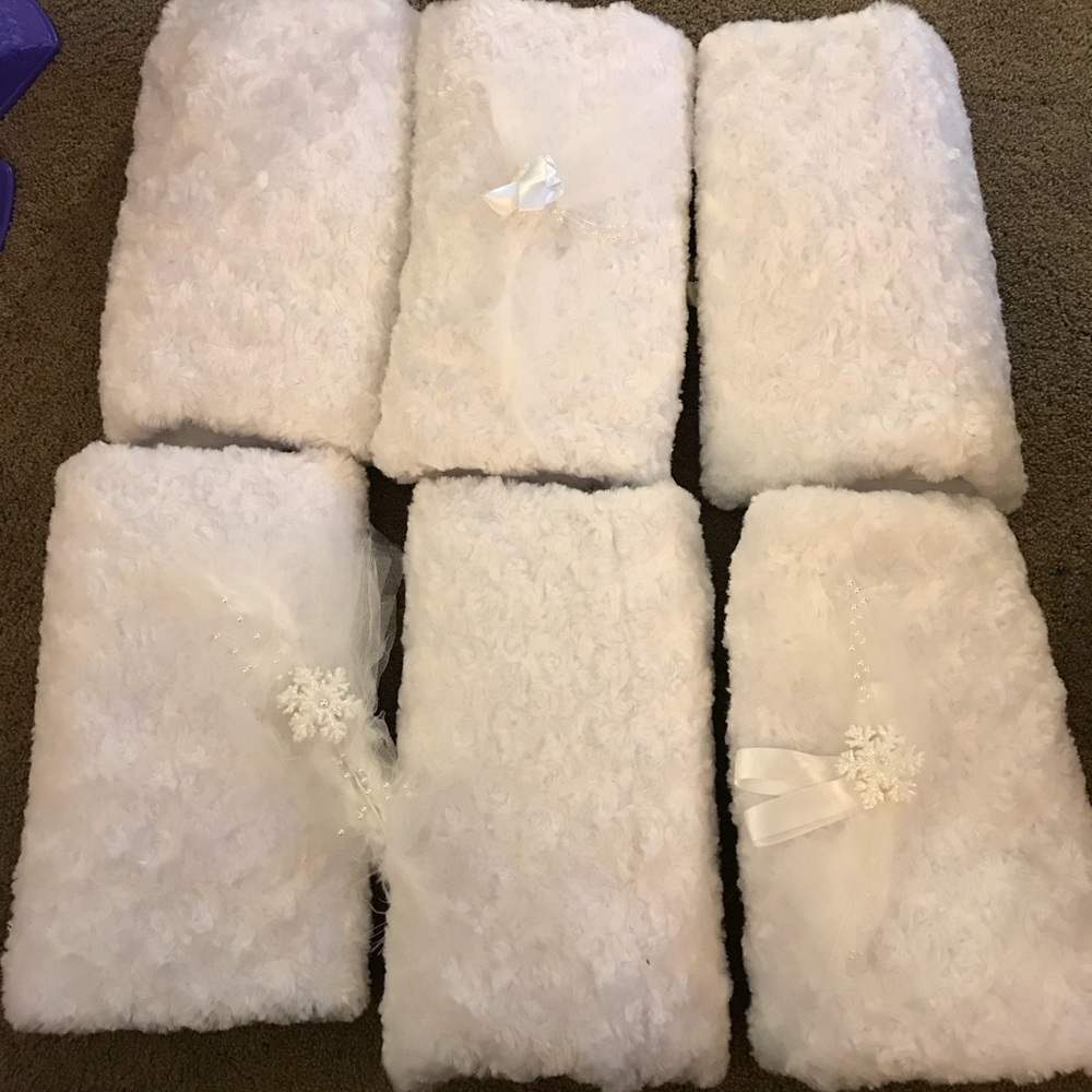 White fur muffs-used for a wedding