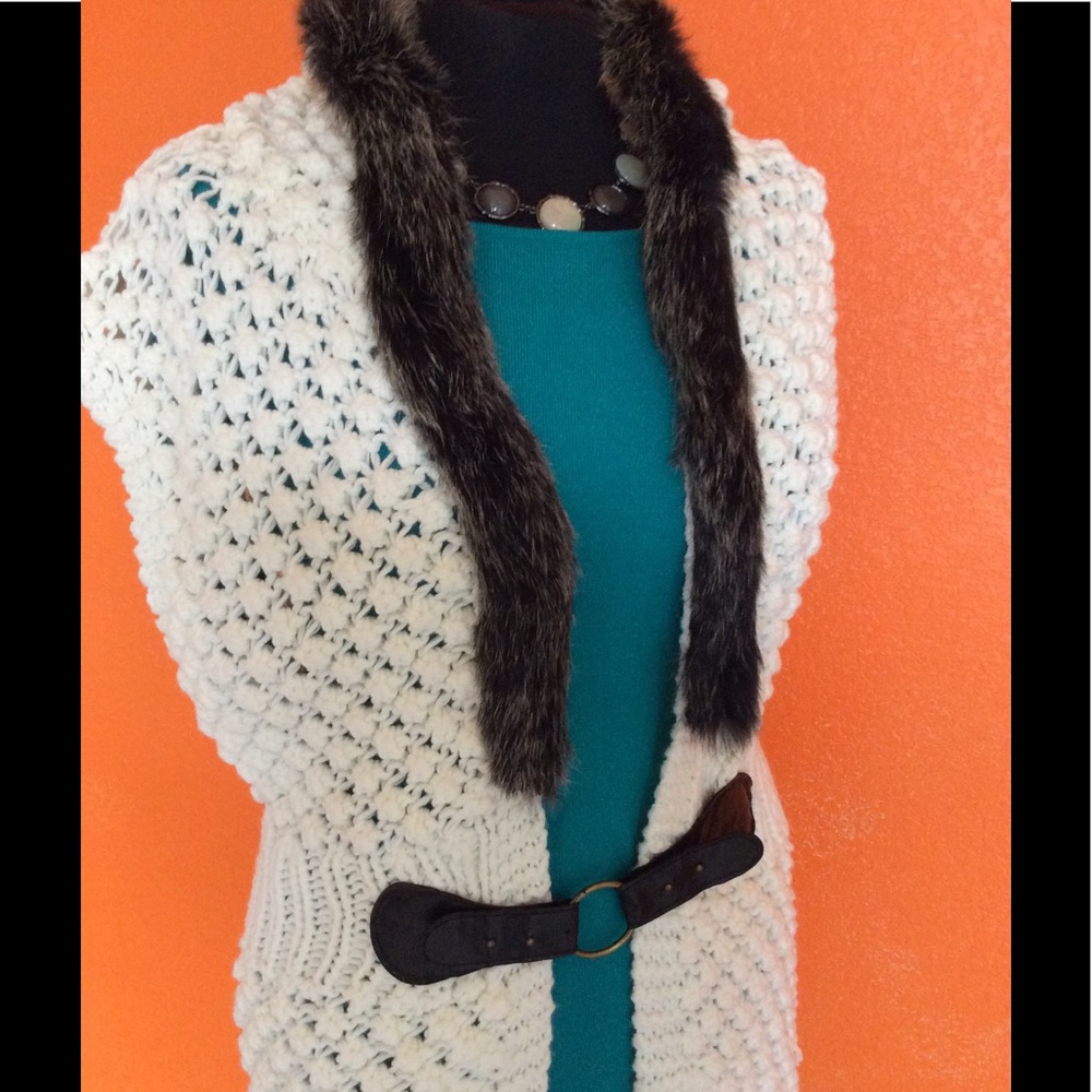 Aspen dreams w/this fun white sweater vest w/hood!