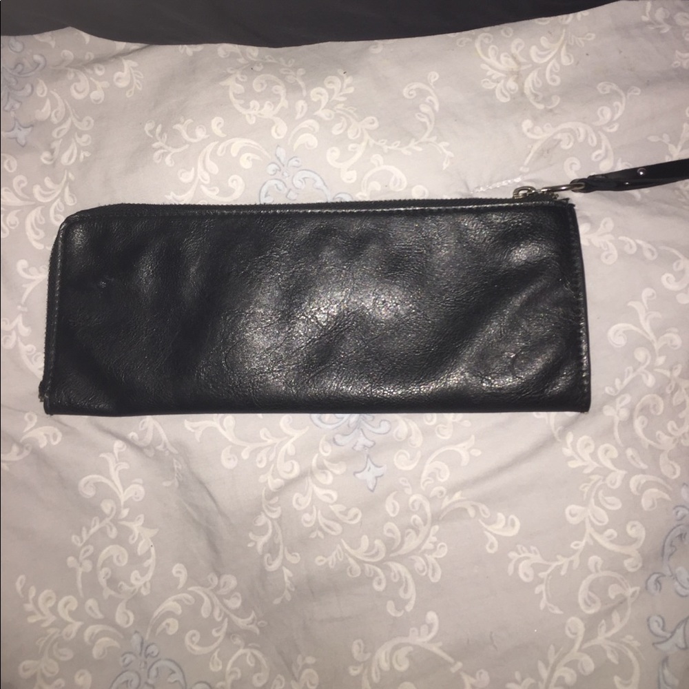 Black leather wristlet.