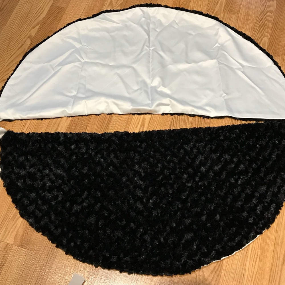 Black fur shawl with white satin lining