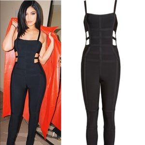 Like New Black bandage jumpsuit with cut out sides