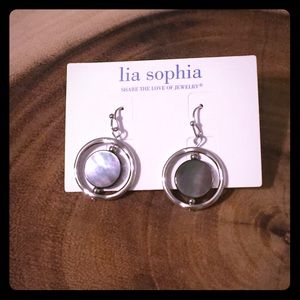 Lia Sophia silver and mother or pearl earrings.