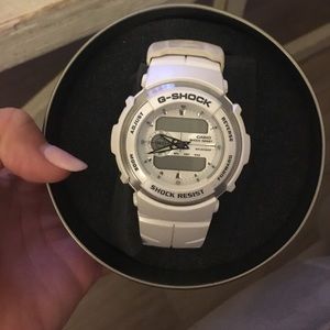 G-shock white and silver watch.