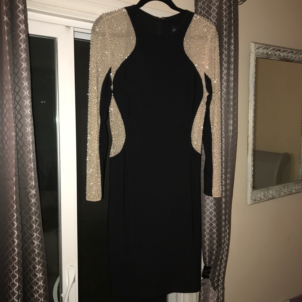 Woman's dress. Black and nude