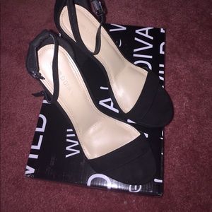 Single strapped black heels