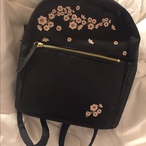 Mini backpack. Satin with embroidery