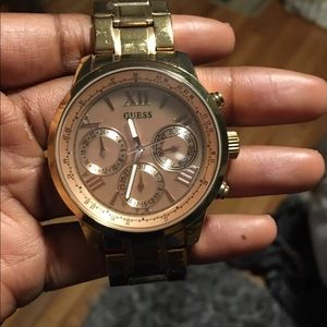 GUESS rose gold watch.