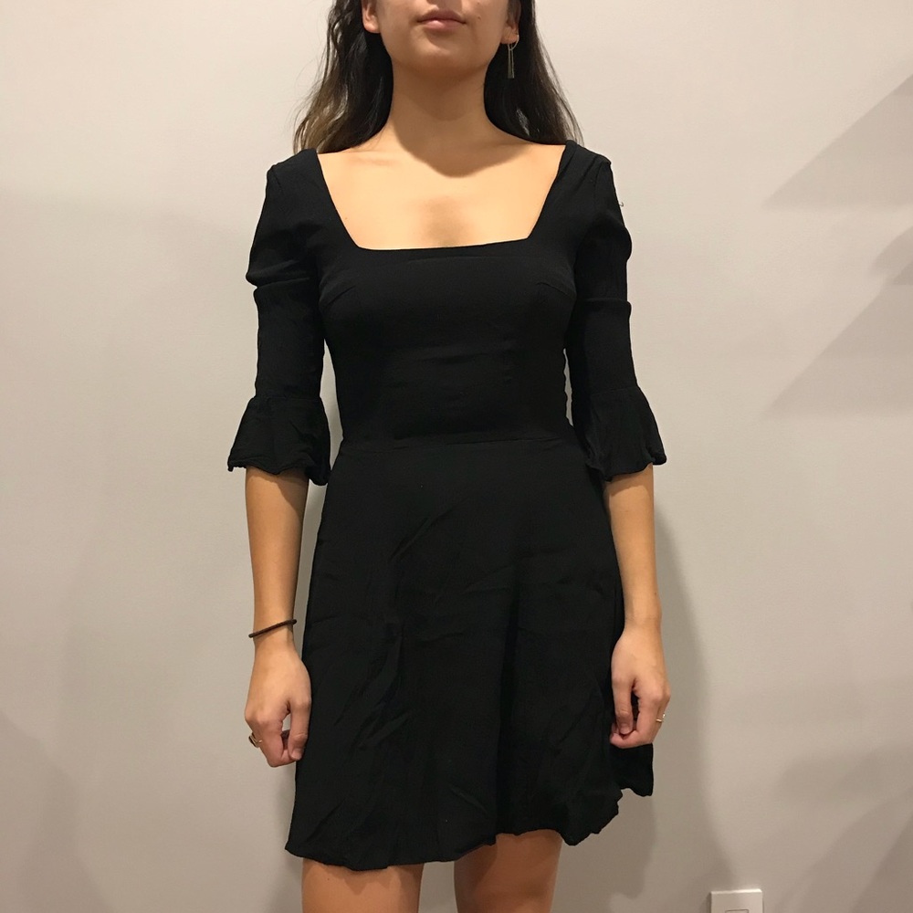 Black flared sleeve dress