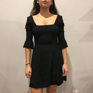 Black flared sleeve dress