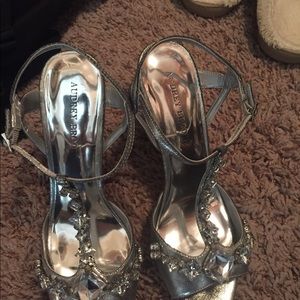 Dressed up high heels silver shoes.