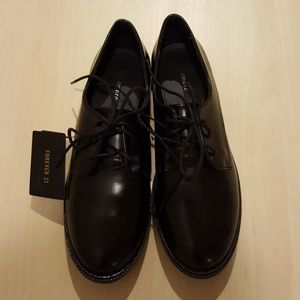 Black classic tuxedo style shoes