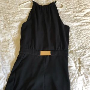Black Zara short jumpsuit w/ open back (small)