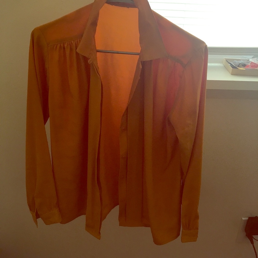 Size Medium Collared Shirt.