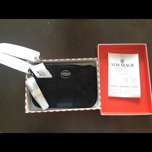 Coach black signature Wristlet