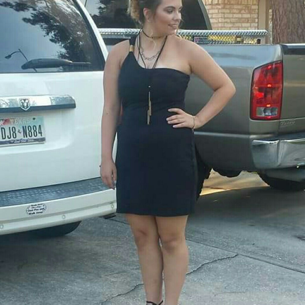 Black dress with copper cuff on shoulder