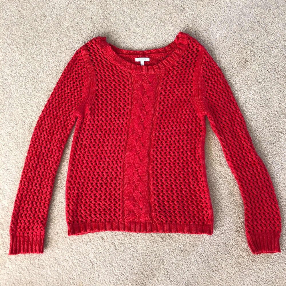 Delia’s red sweater