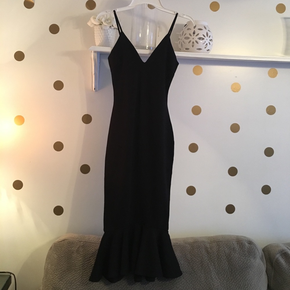 Black form sitting dress