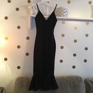 Black form sitting dress