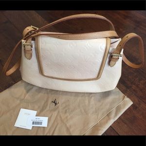 Louis Vuitton shoulder bag in marshmallow.