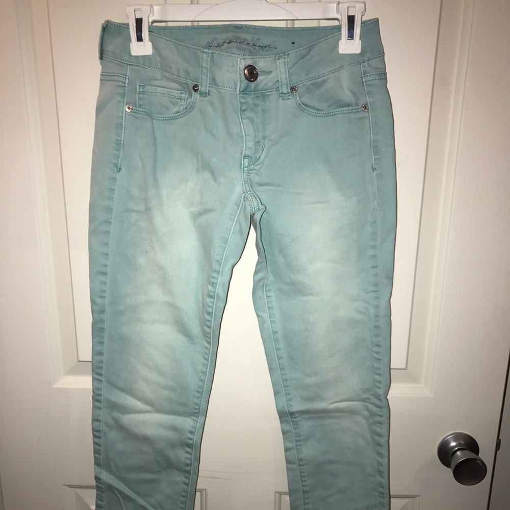 AMERICAN EAGLE aqua colored denim SKINNY JEANS