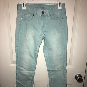 AMERICAN EAGLE aqua colored denim SKINNY JEANS