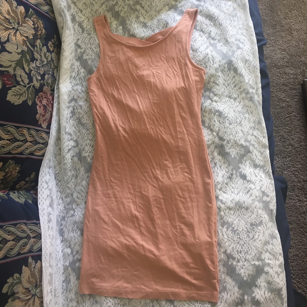 Curve hugging body con dress