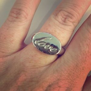 Lia Sophia silver ring. Says Love on front. Size 8