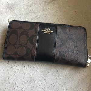 Brown coach zip around walker