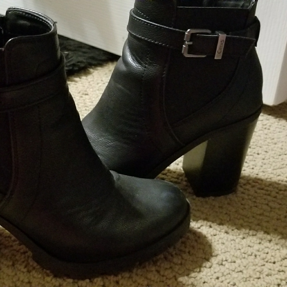 Black ankle boots with silver buckle