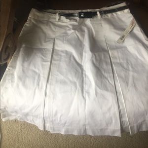White skirt with pleats in front