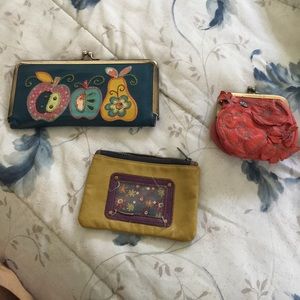 Two coin wallets and one full size wallet
