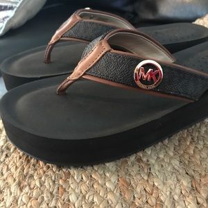 MK Brown logo flip flops size 9