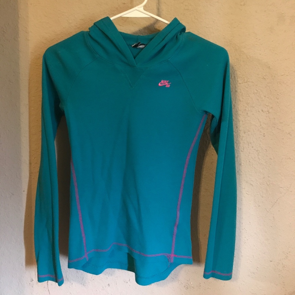 Aqua blue Nike Long sleeve shirt.