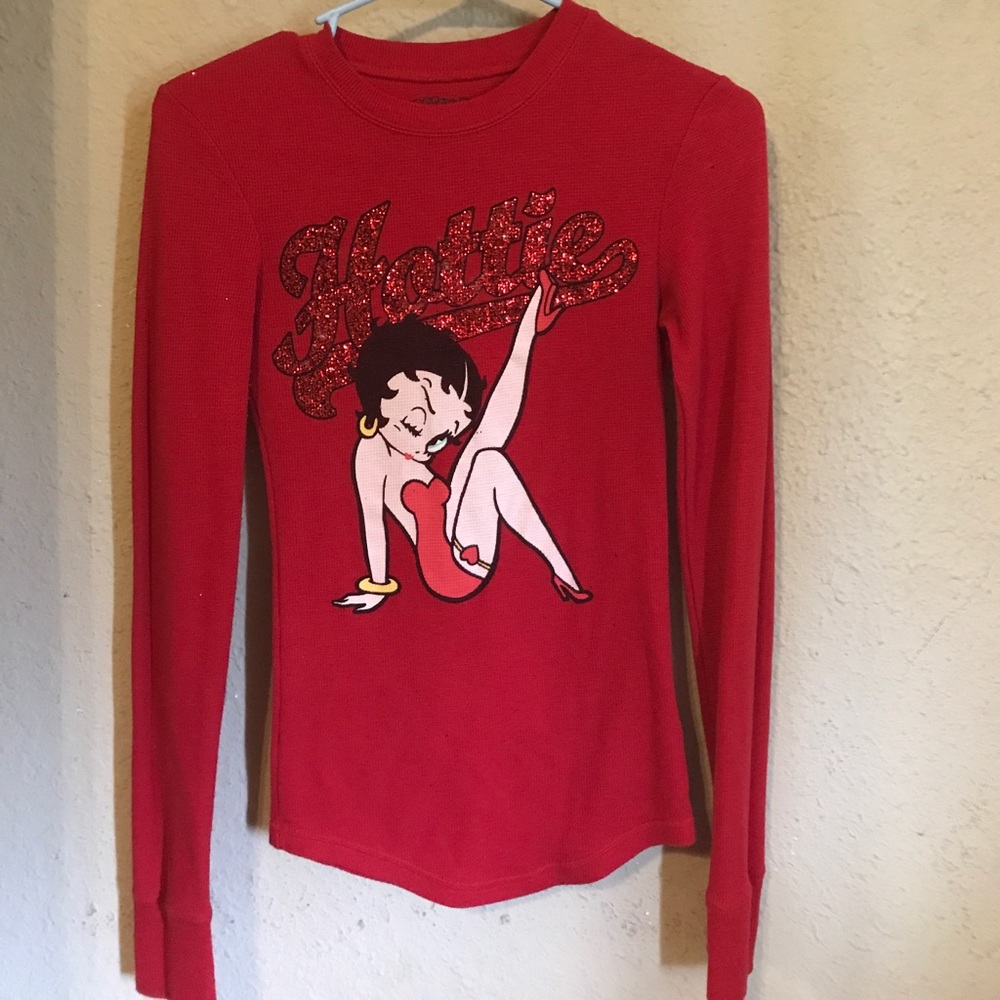 Red longsleeve Betty Boop shirt.