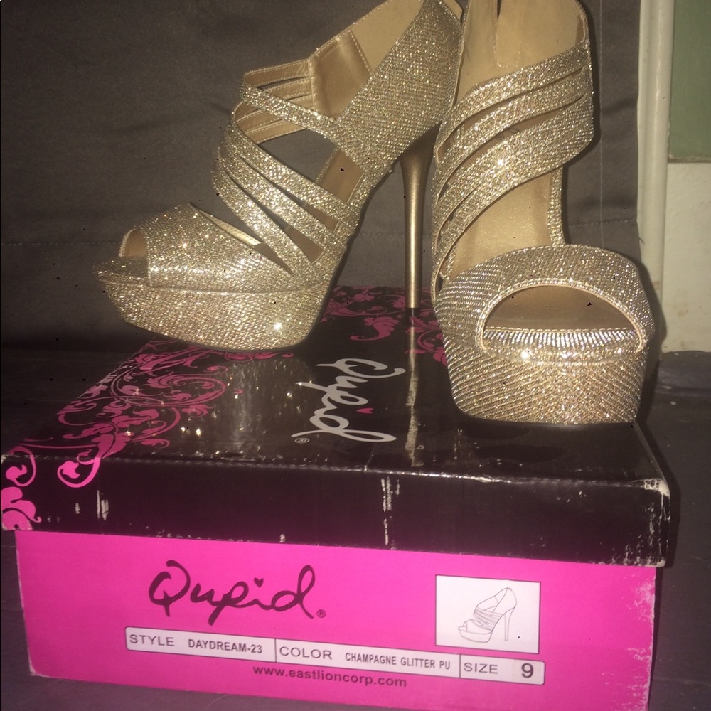 Champagne glitter platform heels.