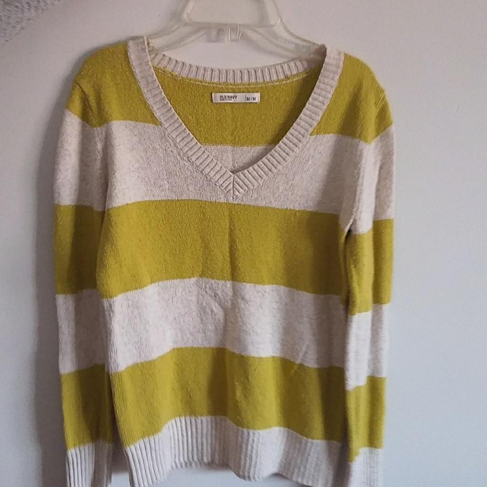 Green and cream striped sweater