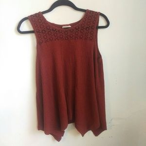 Flowy rusty red asymmetrical top