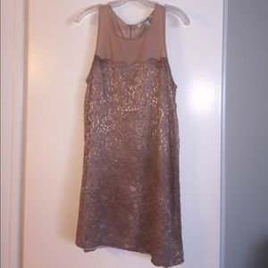 Nude and shimmery shift dress