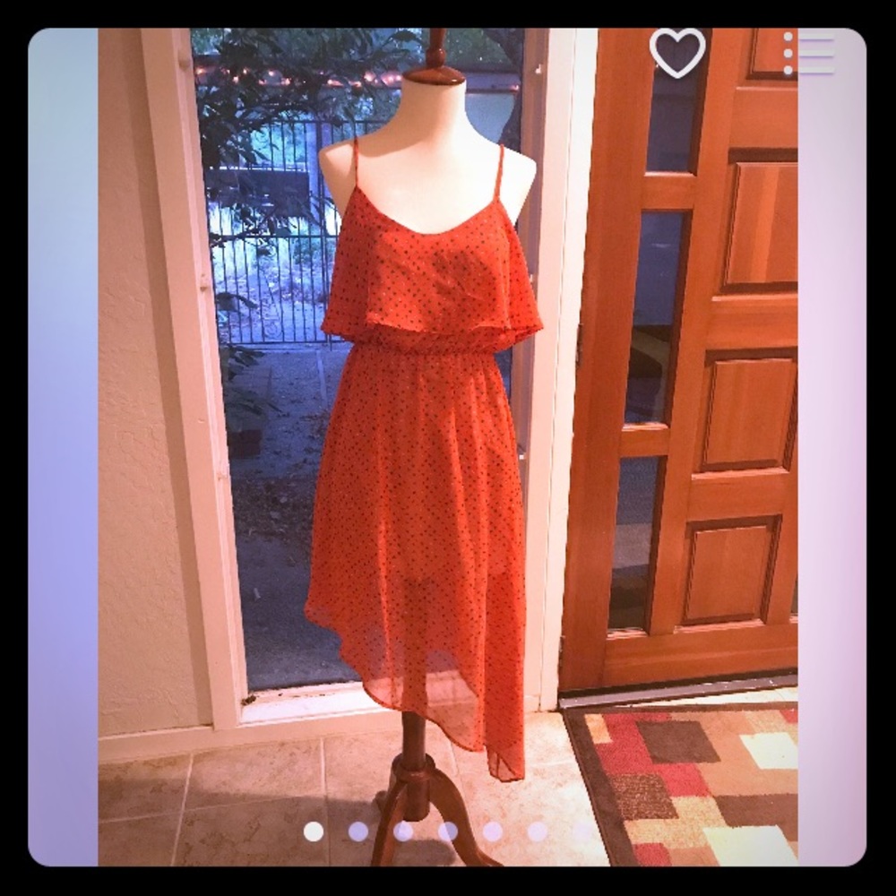 Flowing spaghetti strap dress.