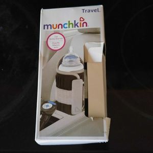 Travel Munchkin bottle warmer( brand new)