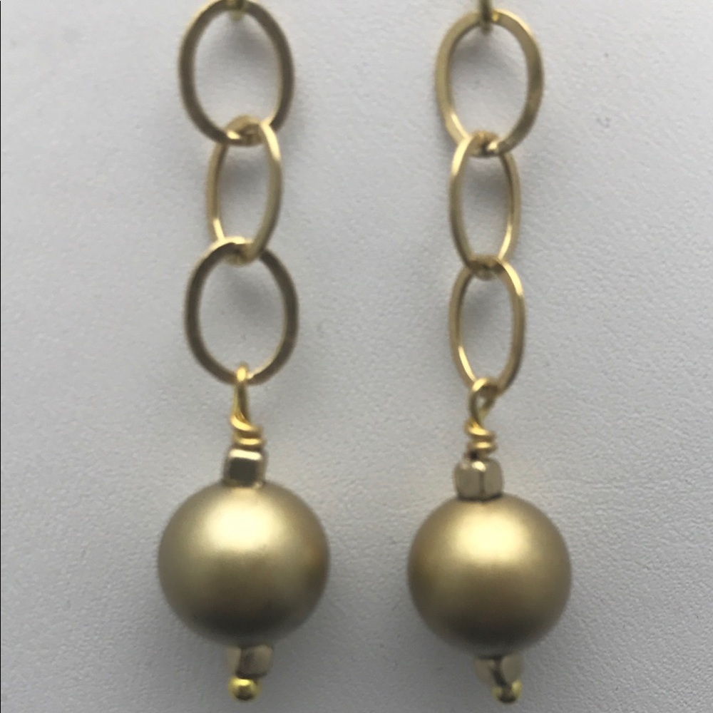 Gold ball festive earrings.