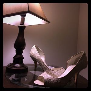 Beige high heel shoes