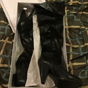 Black heeled boots. Size 7